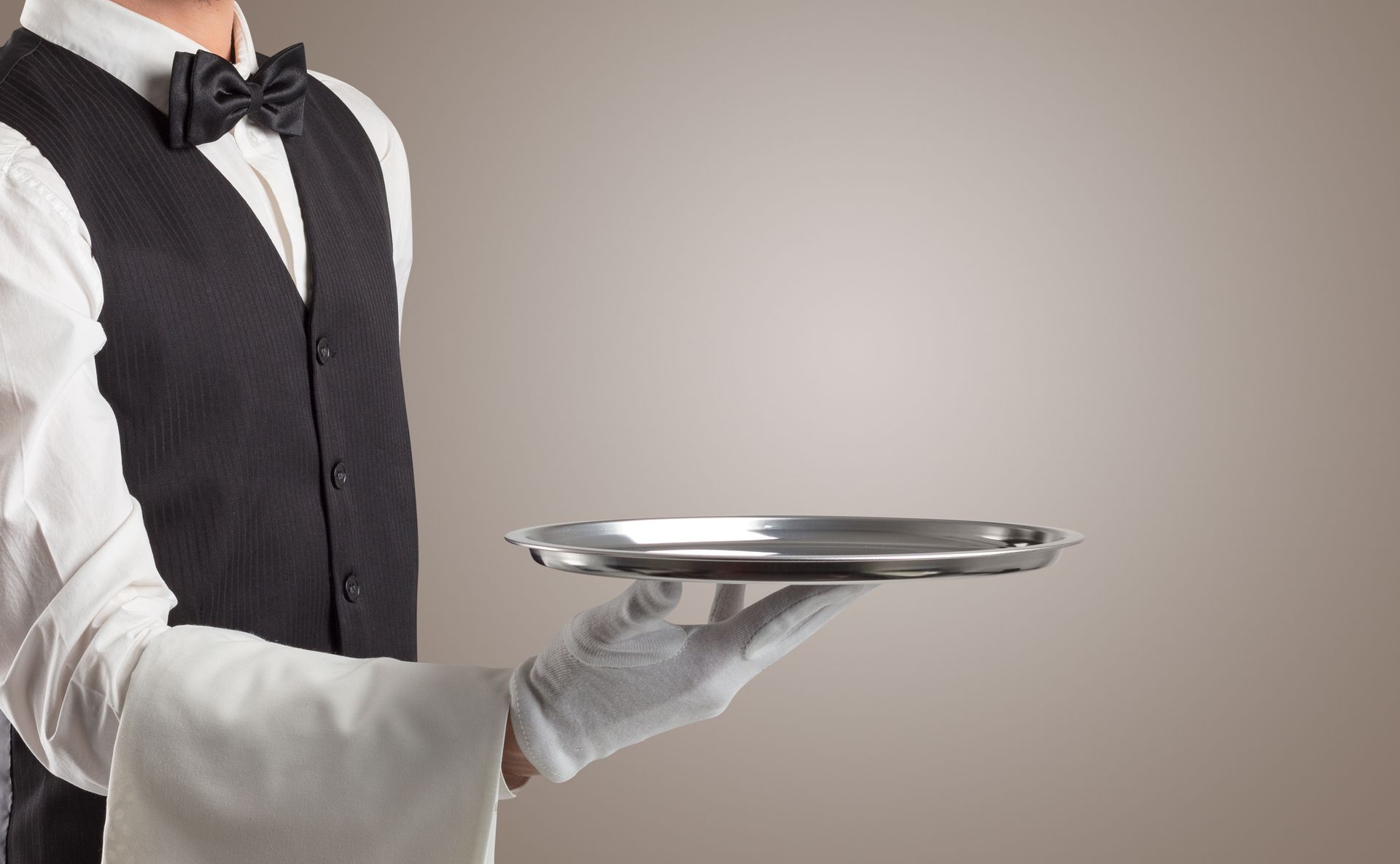 Waiter carrying a tray
