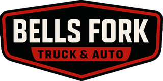 Logo for Bells Fork Truck & Auto in white text on a black and red shield.