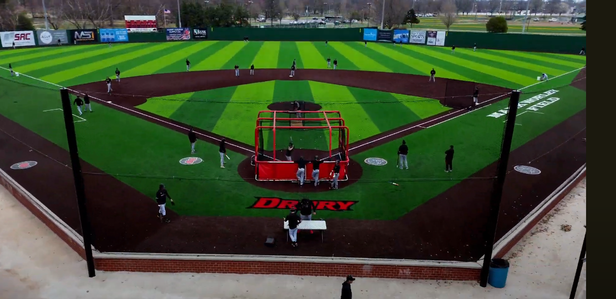An aerial view of a baseball field with the word braves on the field