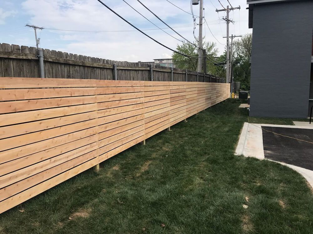 A modern wood fence done by best commercial and residential fencing contractor in Springfield MO.