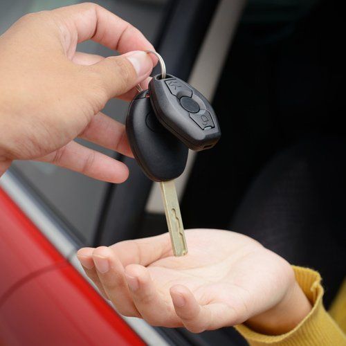 Handing Over Car Keys — Saint Paul, MN — Kat – Key’s Lock & Safe