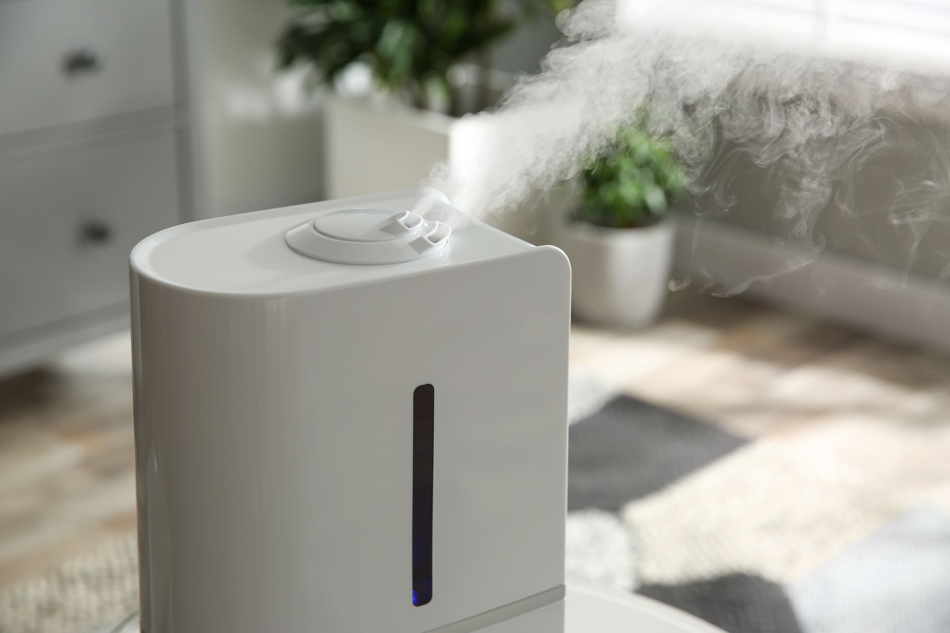 Close-up view of a sleek and modern home humidifier, designed to improve indoor air quality and humidity levels.