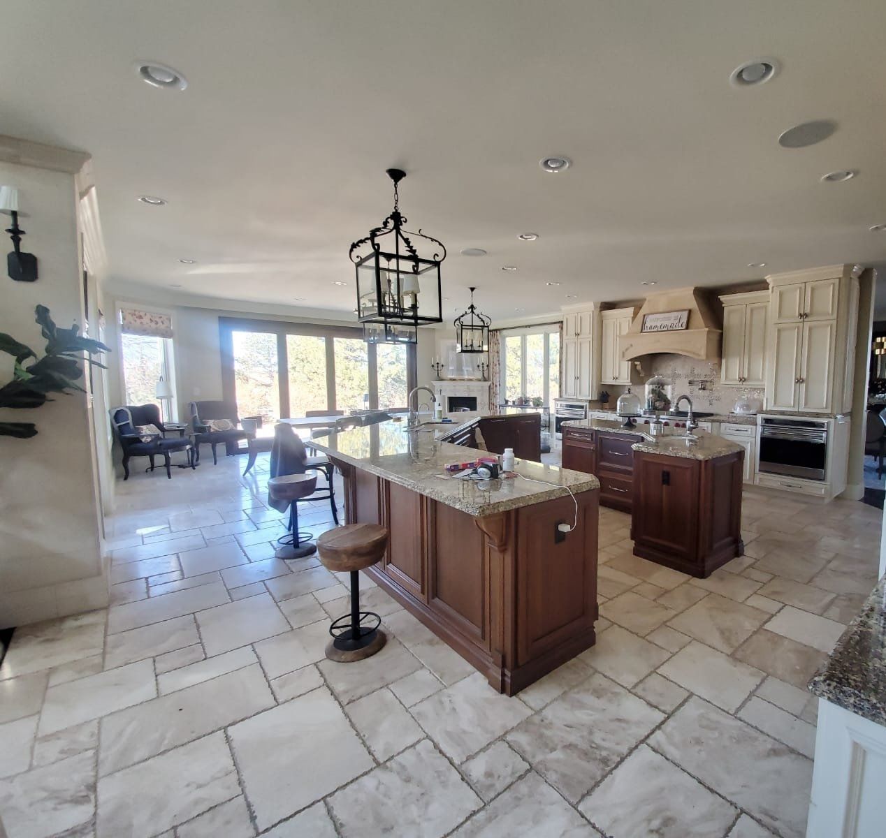A large kitchen with a large island in the middle
