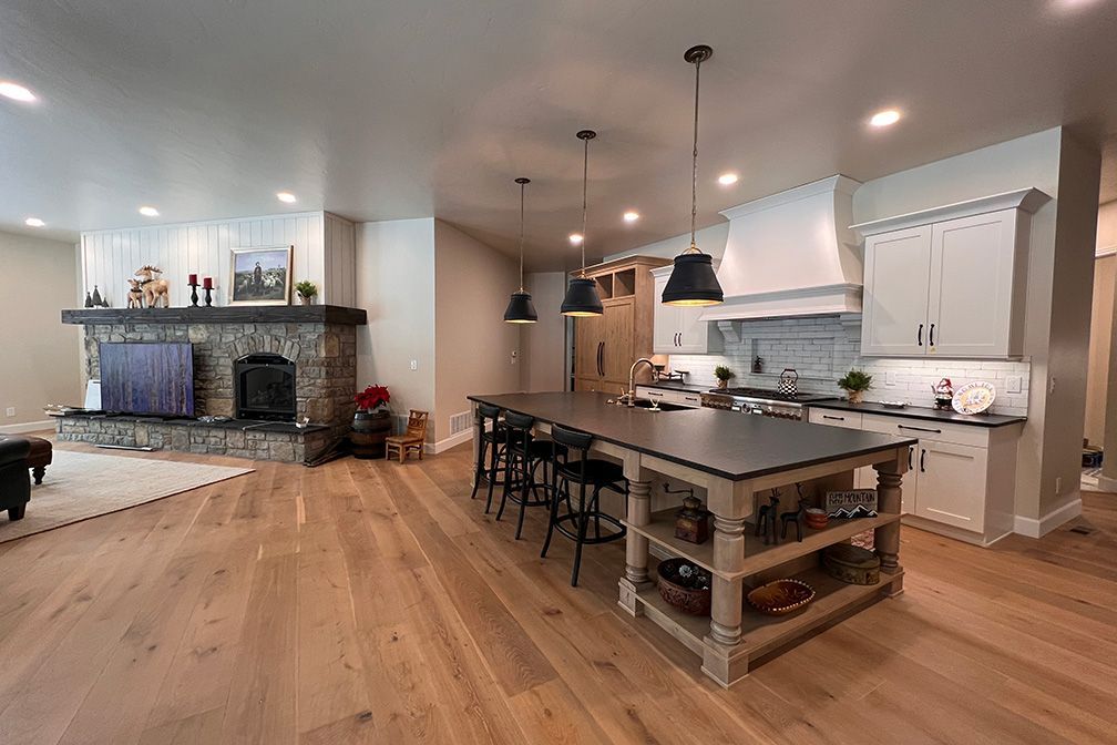 There is a large island in the middle of the kitchen.