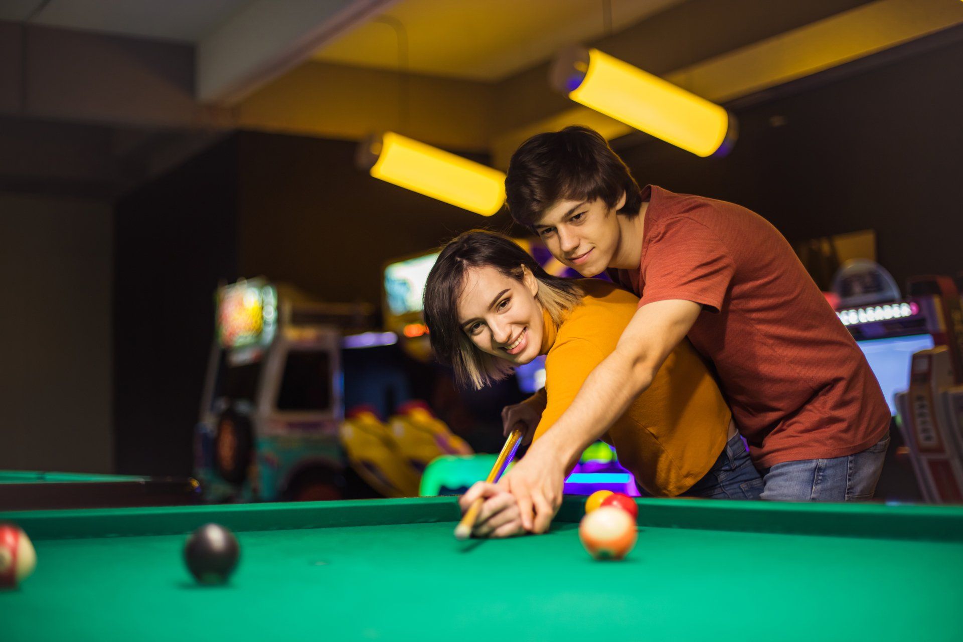 couple spending time billiard room