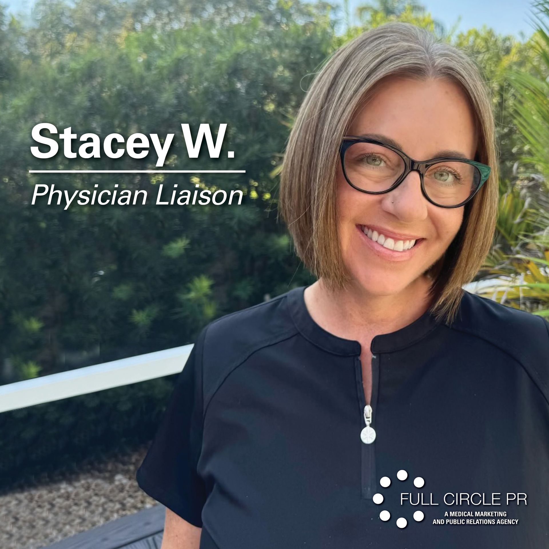 Woman with short hair and glasses, Physician Liaison, smiling outside.