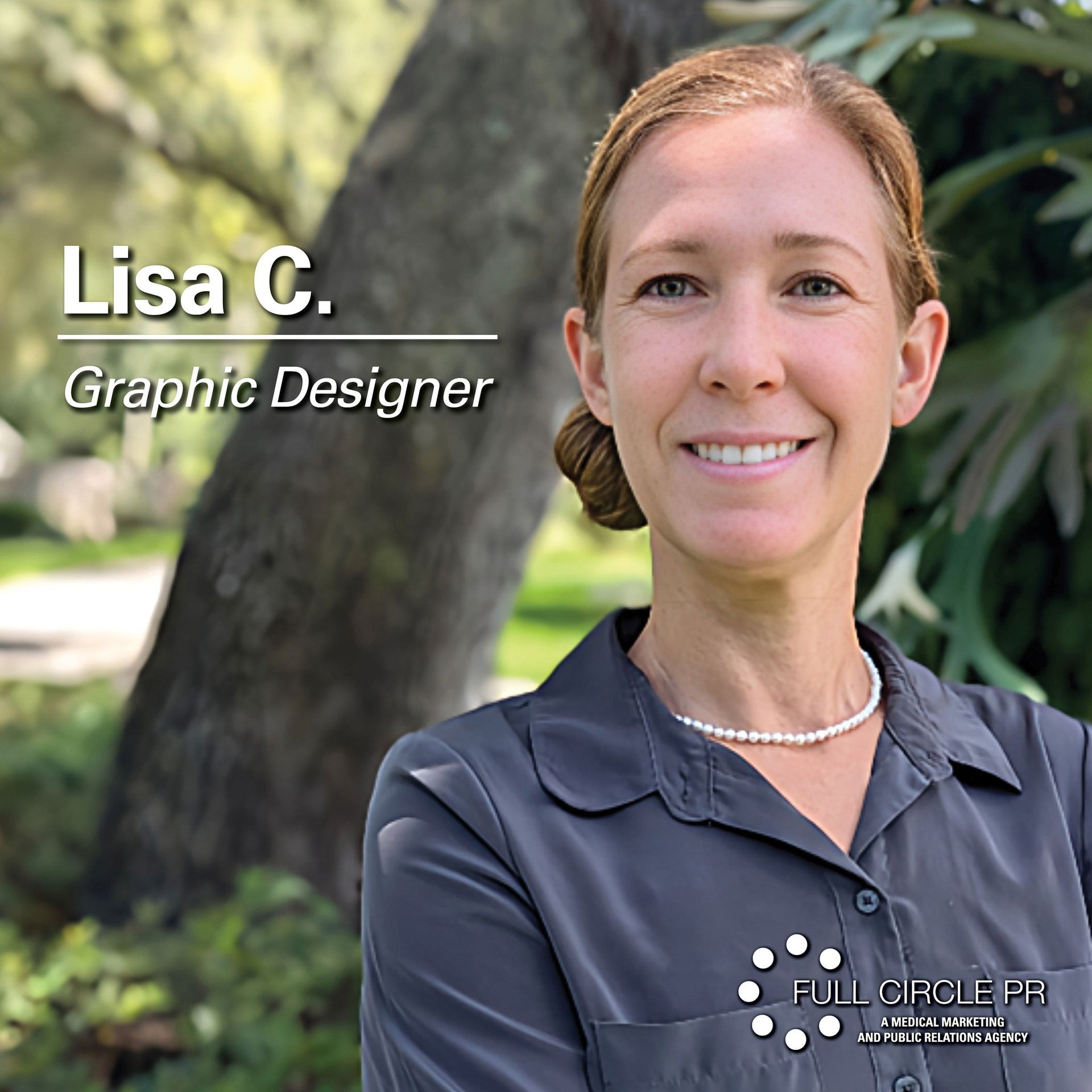Lisa C., Graphic Designer, smiles at the camera in a natural outdoor setting, wearing a pearl necklace.