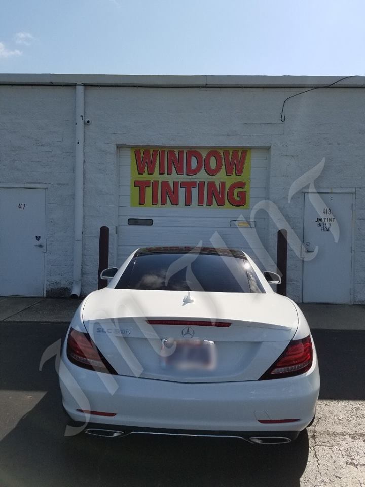 Window Tint Installation — Back Of White Car in Columbus, OH