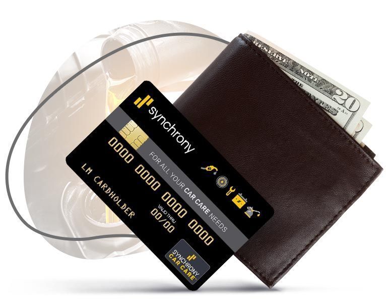 A black synchrony credit card next to a brown wallet | Eden Automotive Repair