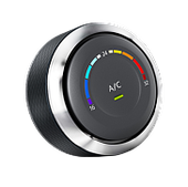 A black and silver a/c knob with a rainbow colored circle around it. | Sunset Tire and Auto Repair