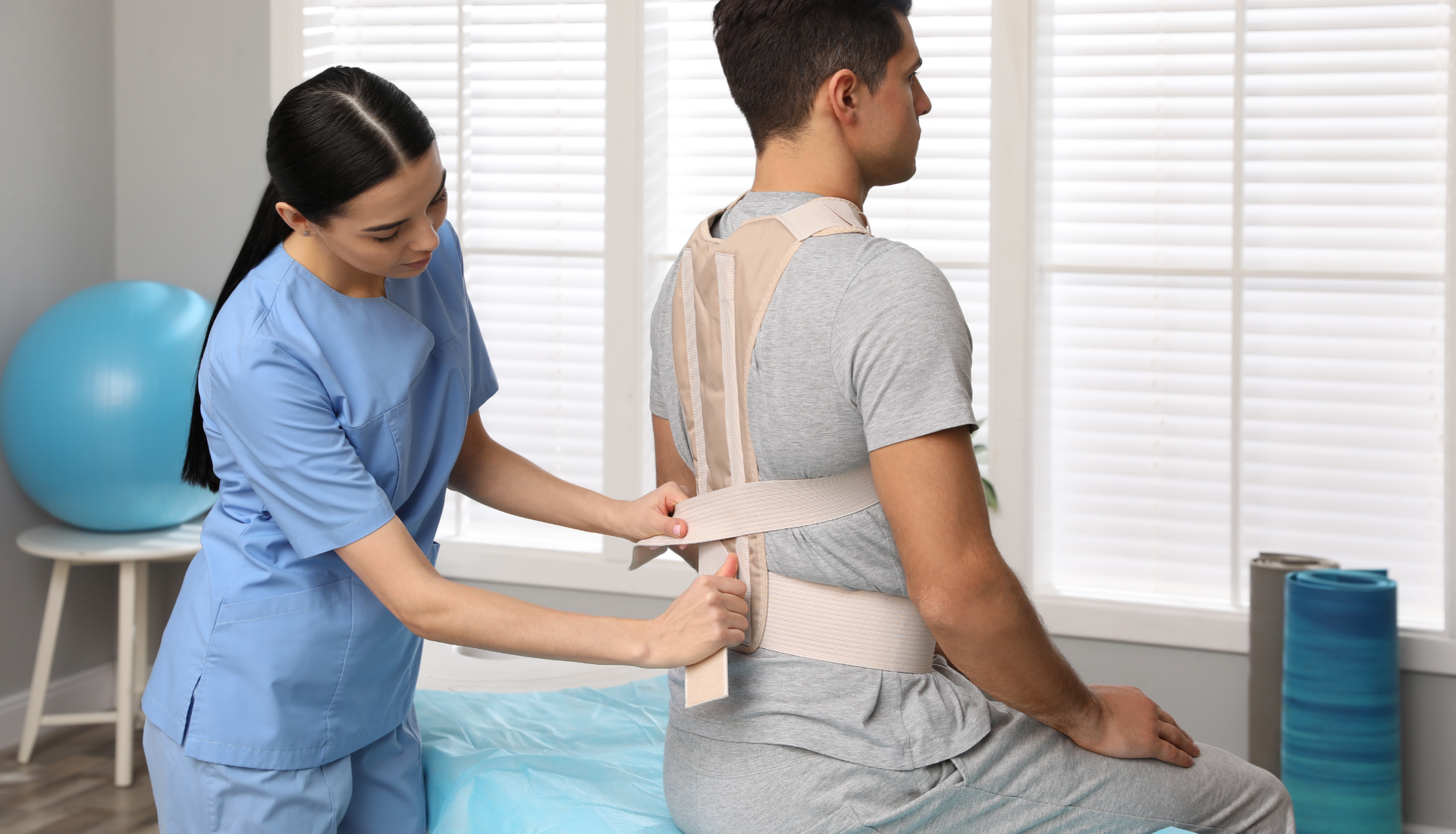Tall white buildings and palm trees against a bright blue sky in Miami.