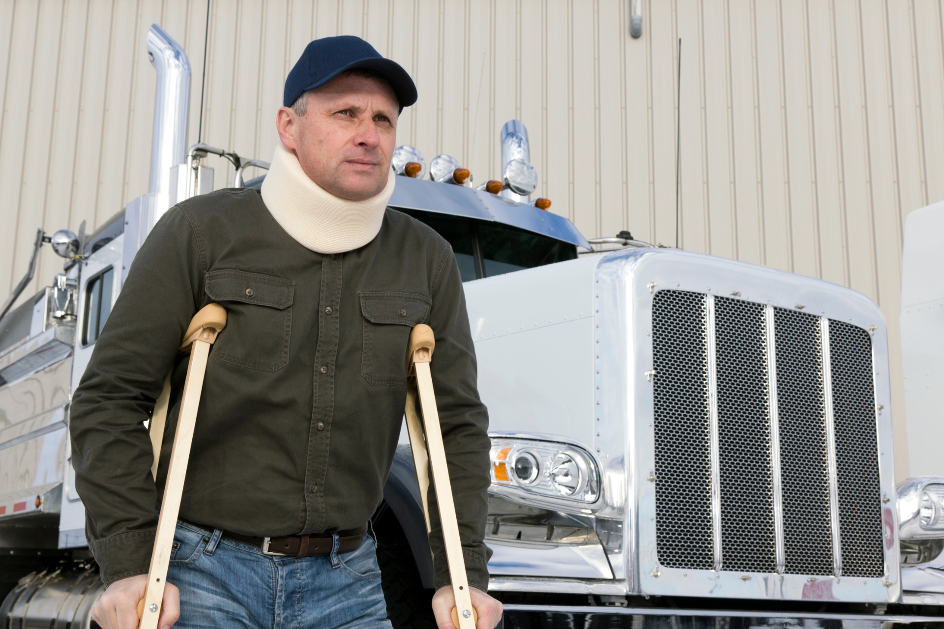 Tall white buildings and palm trees against a bright blue sky in Miami.