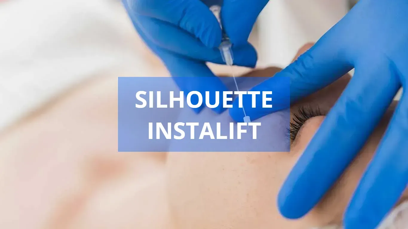 Person receiving Silhouette InstaLift treatment; blue-gloved hands hold needle near face.