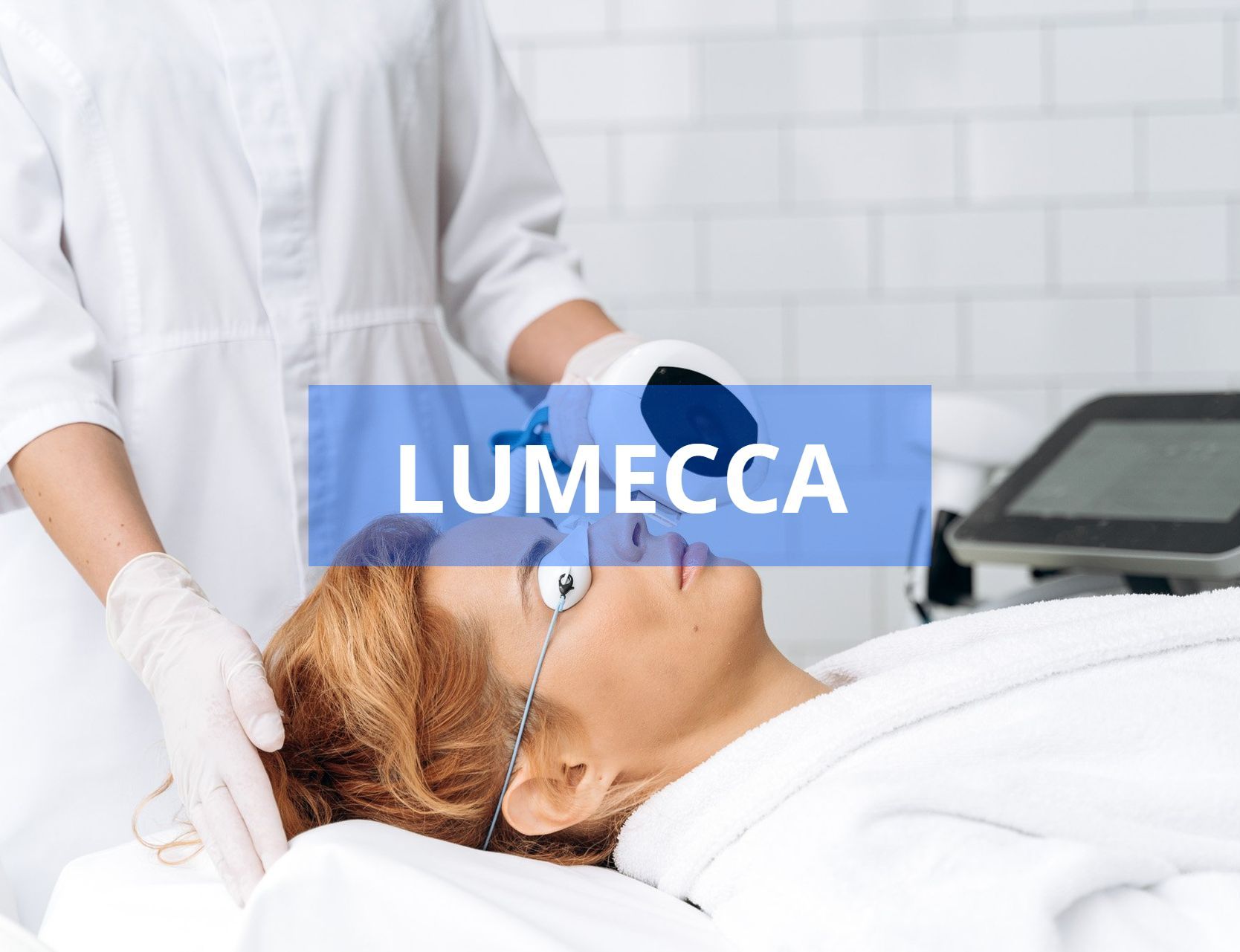 Woman receiving Lumecca laser treatment in a spa setting, with a technician holding a device.