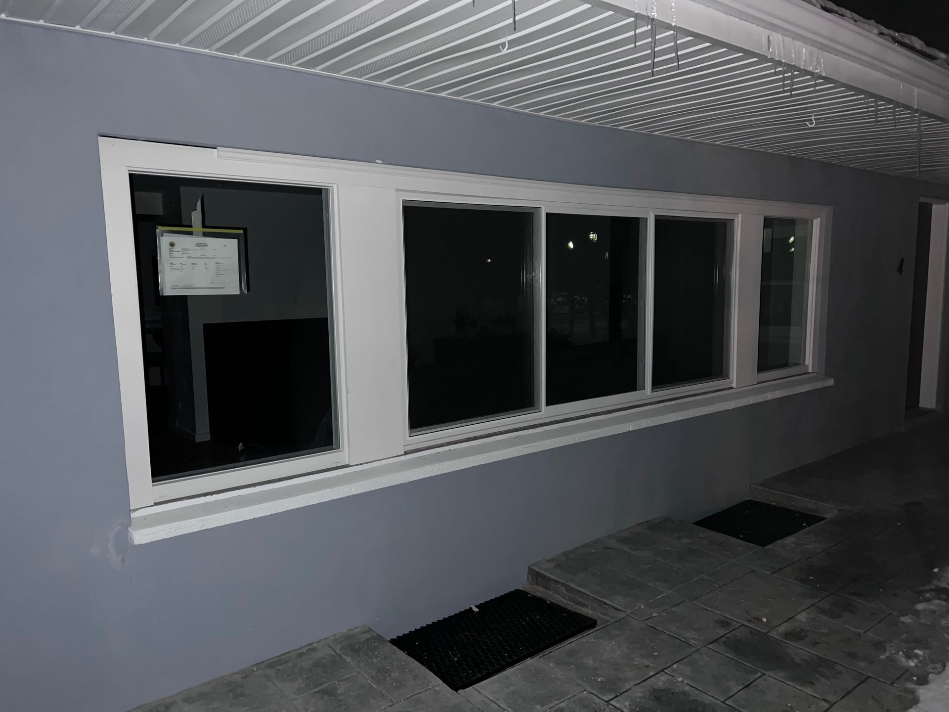 A large window on the side of a house