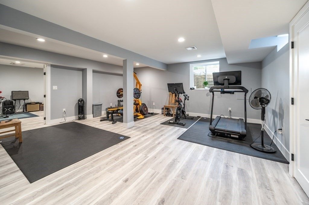 There is a treadmill in the middle of the room.
