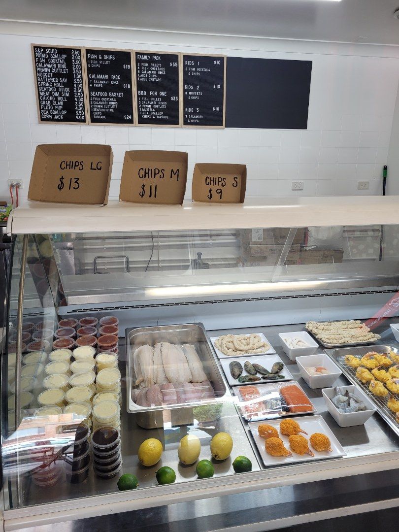 A Seafood Display Case With Various Items — Aussie Fish & Chips Nelson Bay in Nelson Bay, NSW