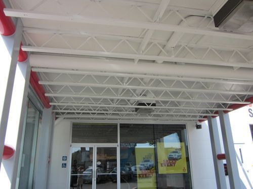 A building with a sign that says ' s ' on it