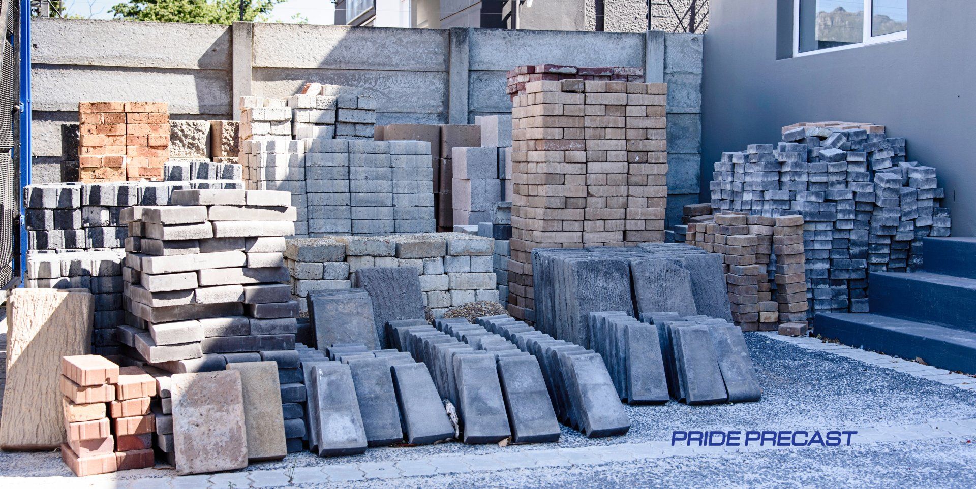 A bunch of bricks are stacked on top of each other in a building.