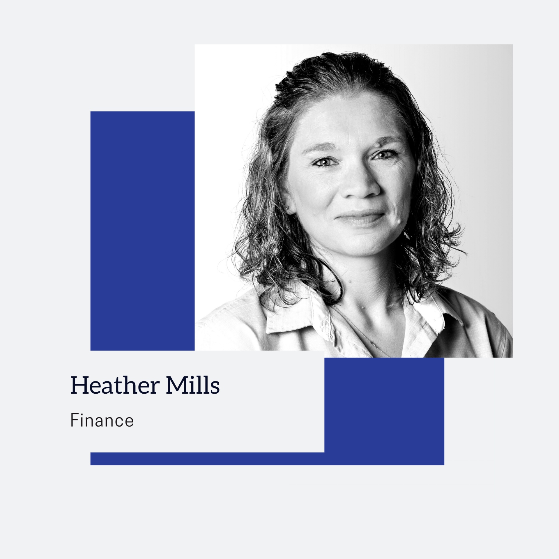 A black and white photo of a woman with curly hair.