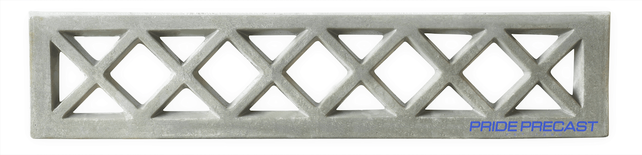 A piece of concrete with a pattern of triangles on it