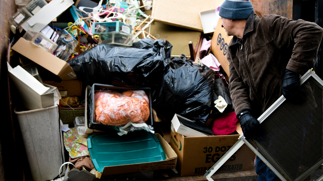 A man is doing hoarder cleanout services