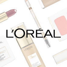 L'Oréal makeup products: foundation, lipstick, eyebrow pencil, and blush. White background.