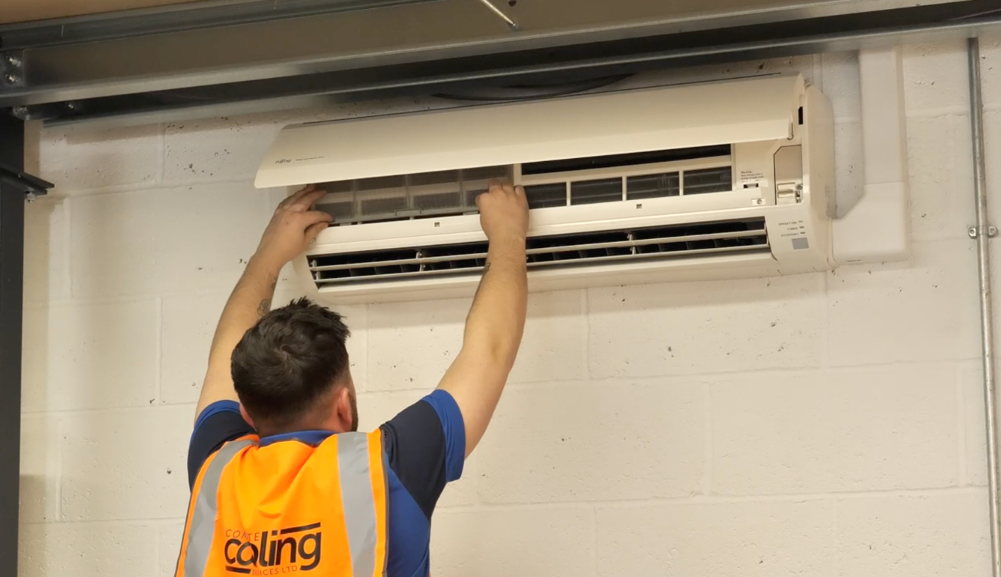 Complete Cooling Services installing Air Conditioning Unit