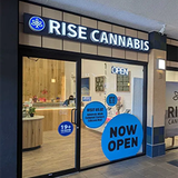 Entrance to a Rise Cannabis store with blue 