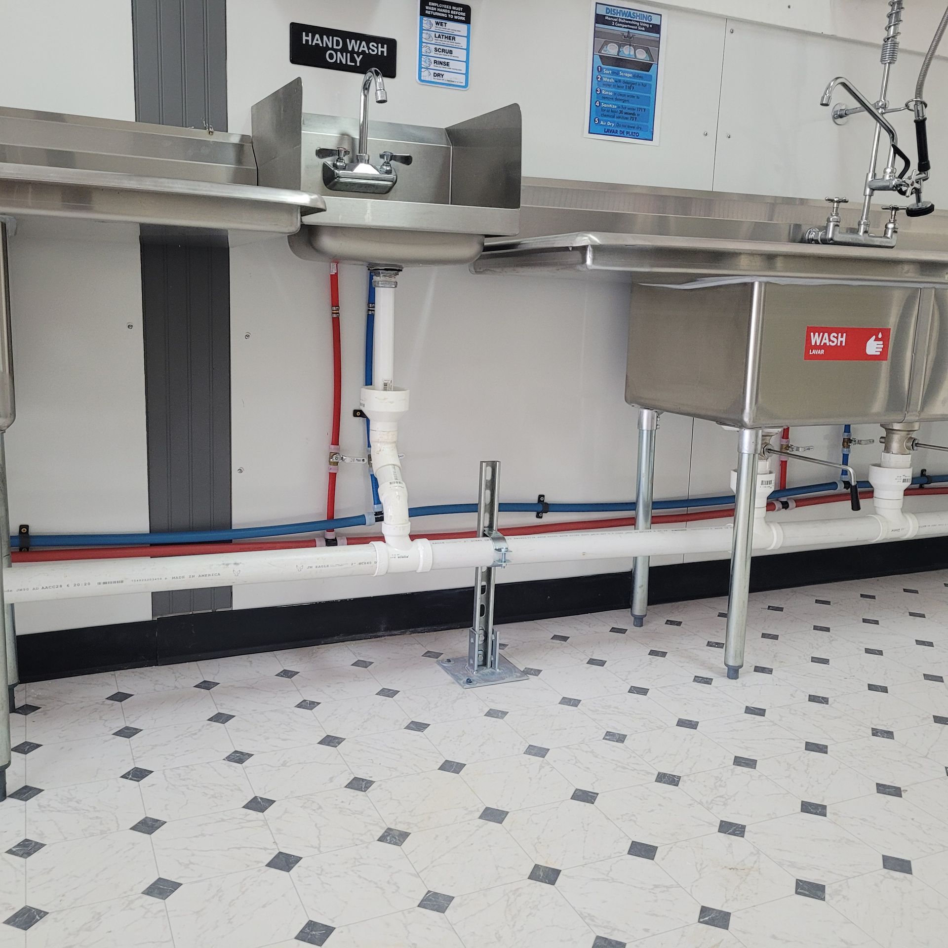 A stainless steel sink with the word pulp on it