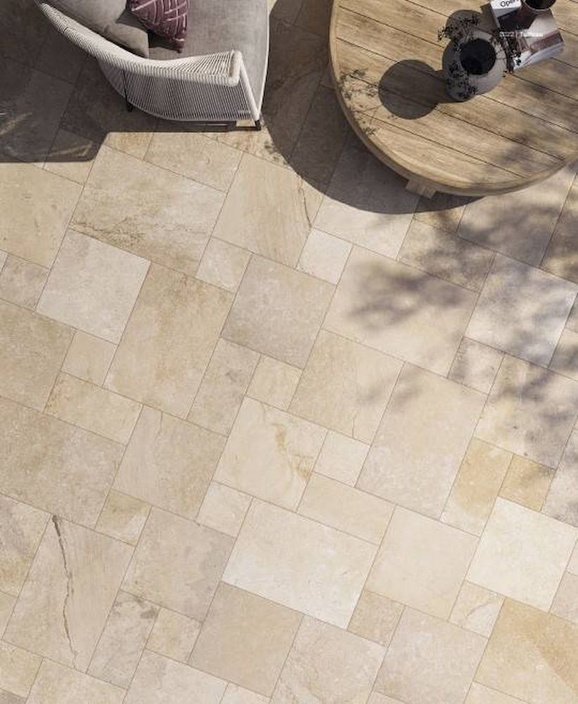 An Aerial View Of A Tiled Floor With A Chair And A Table — Corrimal Ceramic Tiles Pty Ltd in Nowra, NSW