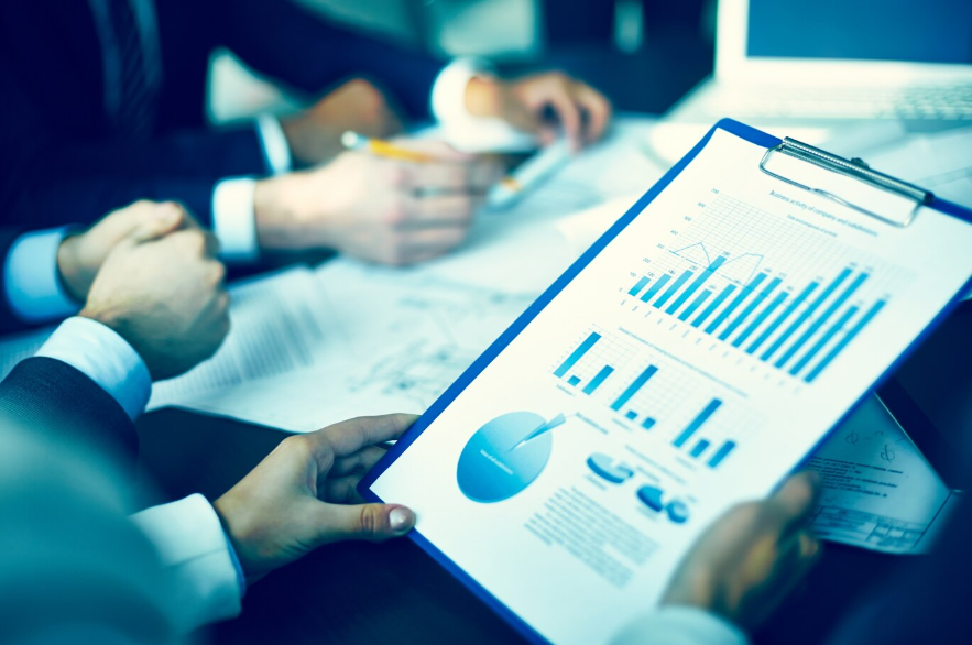 a person holding a report