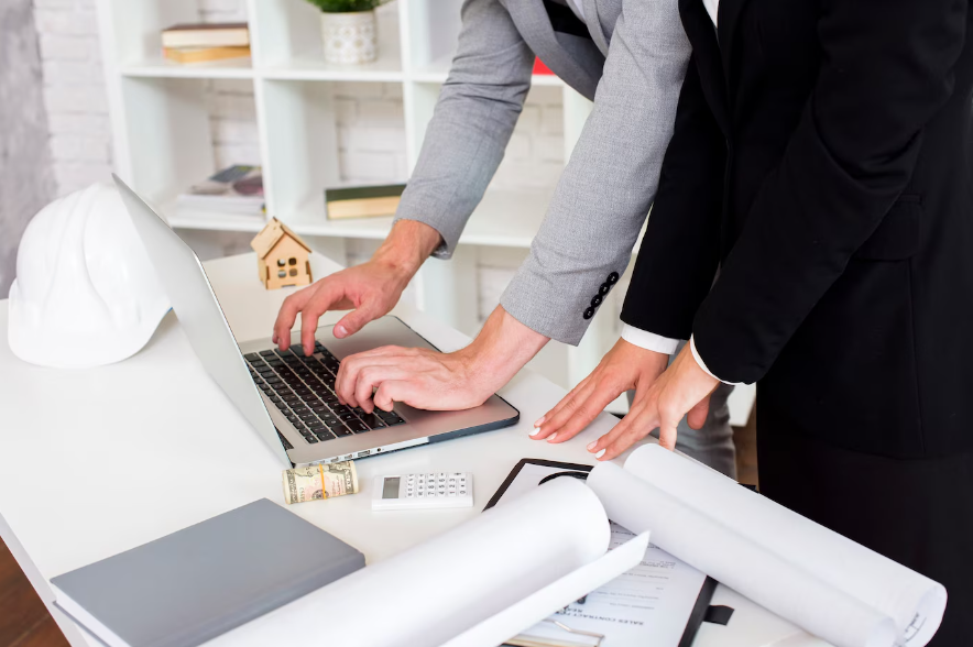 a property manager using a laptop