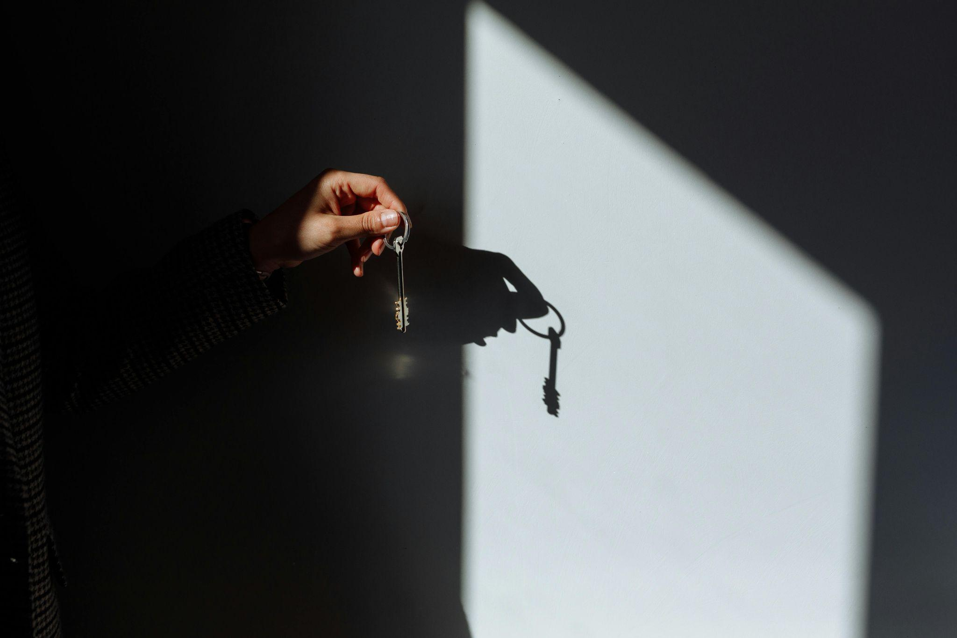 Person holding a key
