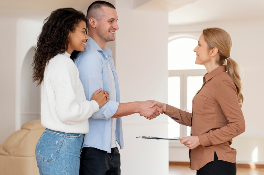 a female realtor shaking hands