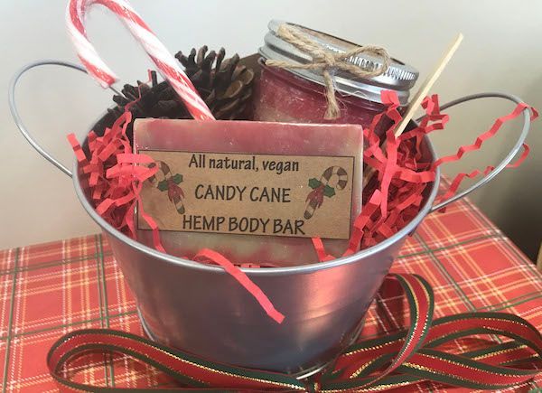 Bottle of MediHerb Metabol Complex tablets with cinnamon sticks and powder.