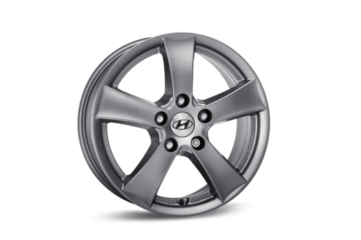 A close up of a hyundai wheel on a white background