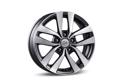 A close up of a car wheel on a white background