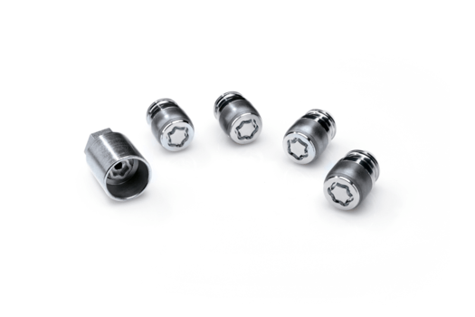 A group of nuts are sitting on top of each other on a white surface.