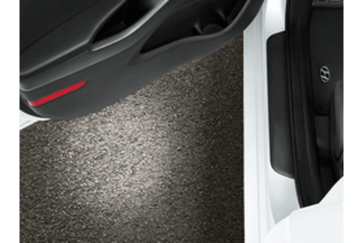 A car door with a light coming out of it