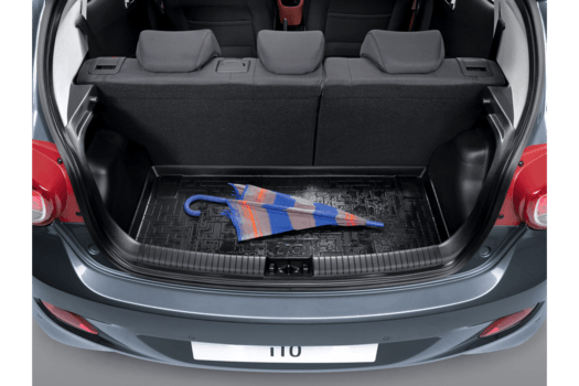 The trunk of a car with an umbrella in it