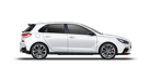 A white car is sitting on a white surface.