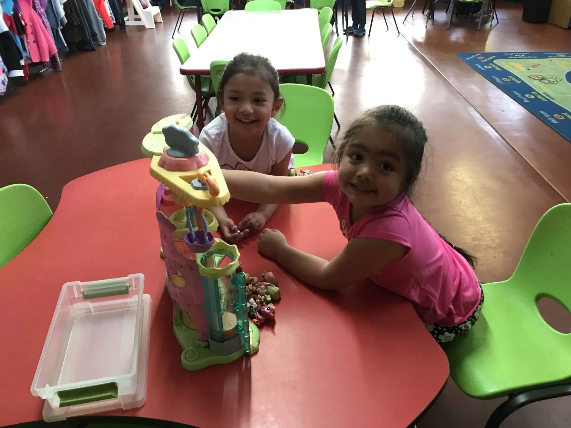 Students Playing on Table — Sacramento, CA — Tot Town Child Development Center, Inc.