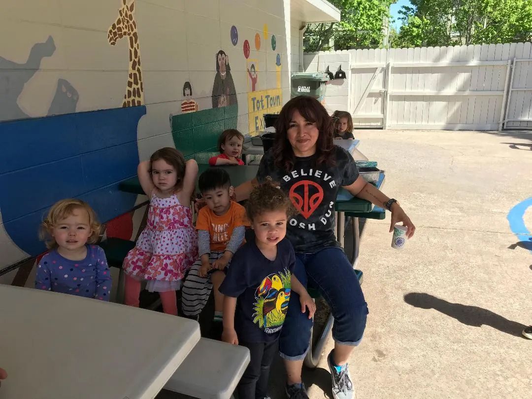 Teacher with Charming Students — Sacramento, CA — Tot Town Child Development Center, Inc.