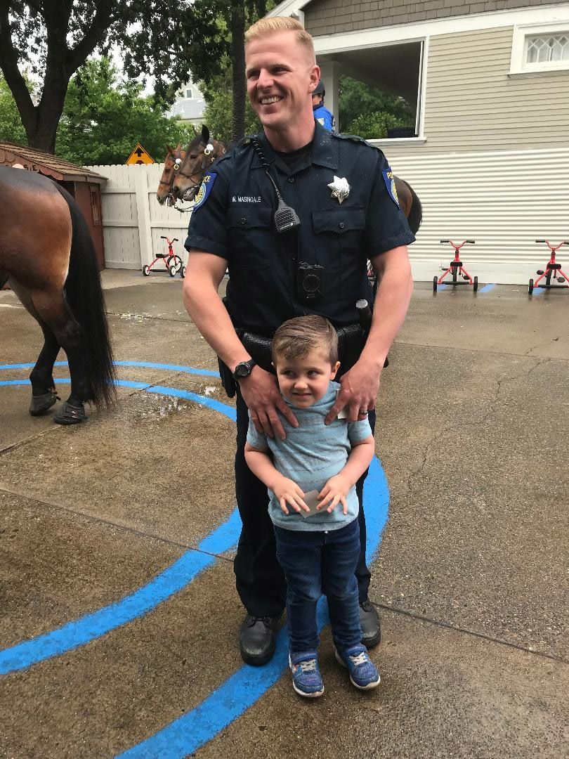 Officer and a Boy — Sacramento, CA — Tot Town Child Development Center, Inc.