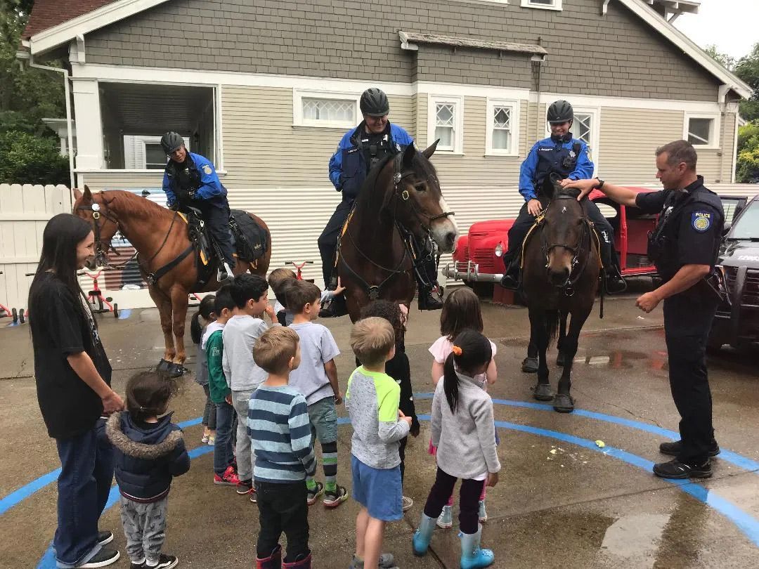 Students Watching the Officers — Sacramento, CA — Tot Town Child Development Center, Inc.