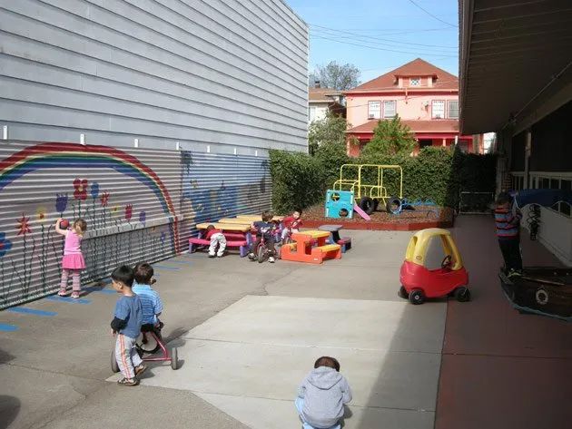 Students Playing in School Playground — Sacramento, CA — Tot Town Child Development Center, Inc.