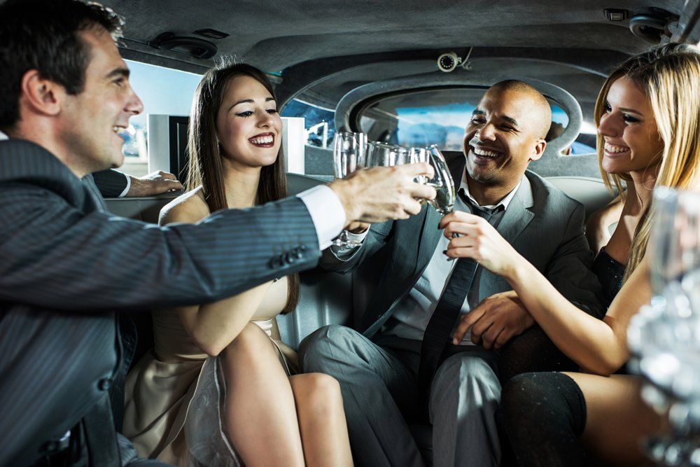 People Drinking Inside Luxury Car — Kalamazoo, MI — Five Star Rides, LLC
