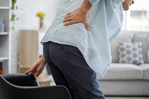 Woman and Her Back Pain — Chattanooga, TN — Specialists In Pain Management