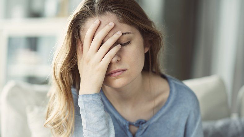 Woman Having a Headache — Chattanooga, TN — Specialists In Pain Management